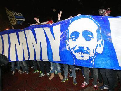 Fans of Deportivo Coruña pay tribute to the man who died in the street fight.