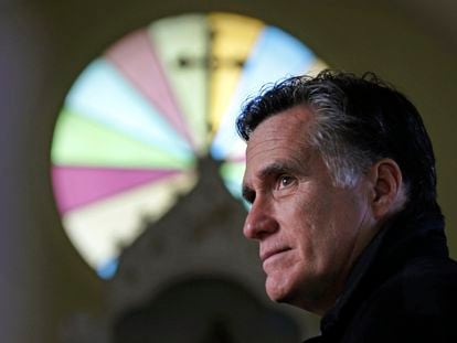 FILE - Republican presidential candidate, former Mass. Gov. Mitt Romney, visits St. Paul's Lutheran Church while campaigning in Berlin, N.H., Dec. 22, 2011. (AP Photo/Charles Krupa, File)