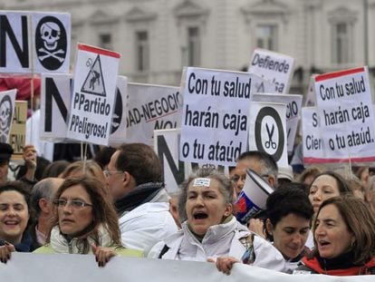 Health workers protest in Madrid Sunday.