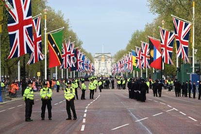 Metropolitan Police officers gather on The Mall ahead of the coronation of King Charles III in London Saturday.