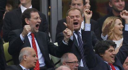 Prime Minister Mariano Rajoy (left) celebrates Spain&#039;s goal during the 1-1 tie with Italy in Gdansk.