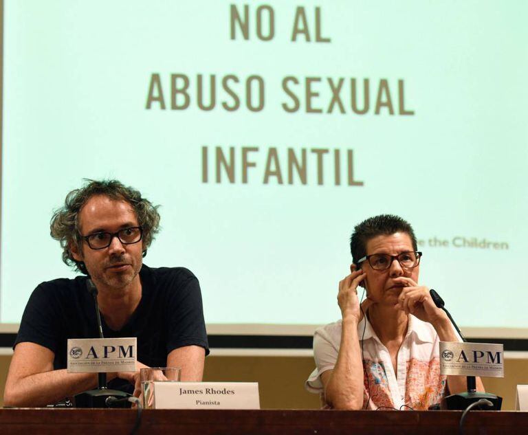 Pianist James Rhodes and Vicki Bernadet appear at a press conference against child abuse.