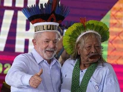 Brazilian President Luiz Inacio Lula da Silva gives a thumbs up after receiving a traditional Indigenous headdress from Cacique Caiapo, Raoni Metuktire, during the closing of the annual Terra Livre, or Free Land Indigenous Encampment in Brasilia, Brazil, Friday, April 28, 2023.