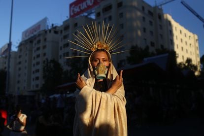 A woman takes part in an event in Santiago to mark this year‘s Women‘s Day.