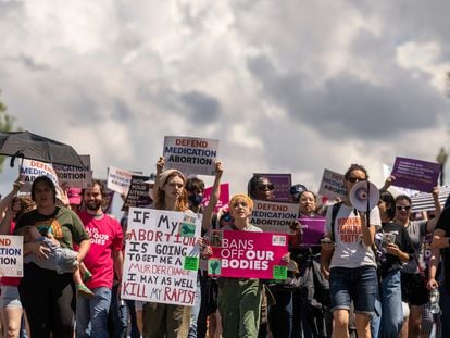 Protesters march past the U.S. Capitol following a Planned Parenthood rally in support of abortion access outside the Supreme Court on Saturday, April. 15, 2023, in Washington.