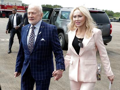 Apollo 11 astronaut Buzz Aldrin, left, and Anca Faur arrive at the Kennedy Space Center for a visit in recognition of the Apollo 11 moon landing anniversary, on July 20, 2019, in Cape Canaveral, Fla.