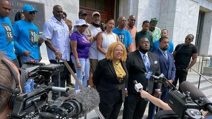 Attorneys and criminal justice advocates stand outside Louisiana's Supreme Court on May 10, 2022.