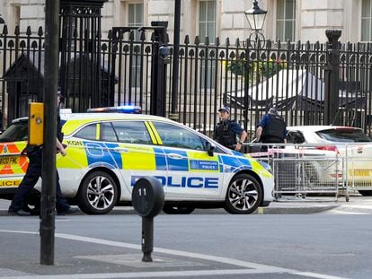Police at the scene after a car collided with the gates of Downing Street in London in London, Thursday, May 25, 2023.