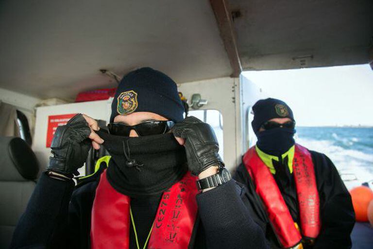 Two customs officers on patrol along the Guadalquivir.
