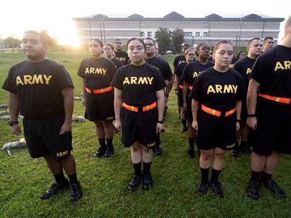 Students in the new Army prep course stand at attention after physical training exercises at Fort Jackson in Columbia, S.C., Aug. 27, 2022.