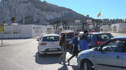 Cars wait in line at Spain's border with Gibraltar on Wednesday.