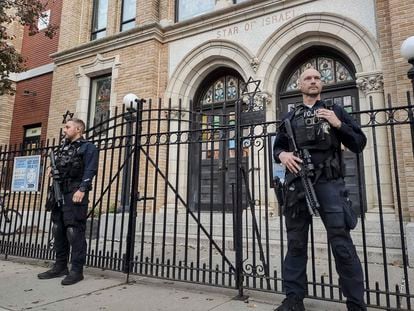 Hoboken Police officers stand watch outside the United Synagogue of Hoboken, Nov. 3, 2022, in Hoboken, N.J.