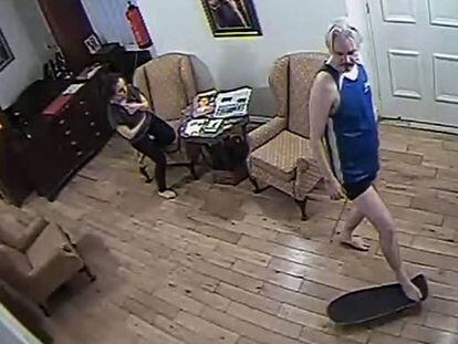 Screenshot of Julian Assange, with a skateboard, and his collaborator Stella Morris in the Ecuadorian embassy in London.