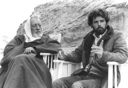 British actor Alec Guinness with director Lucas on set.