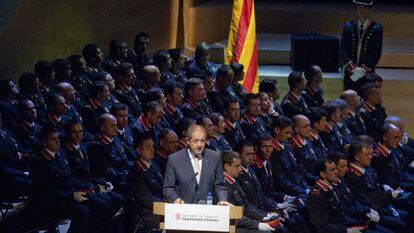 Catalan interior commissioner Felip Puig speaking to members of the Mossos regional police force.