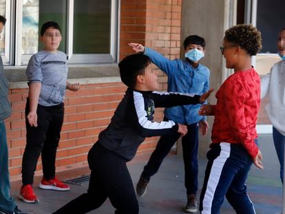 Children playing in the Spanish region of Catalonia after the requirement for mask use in schoolyards was lifted.