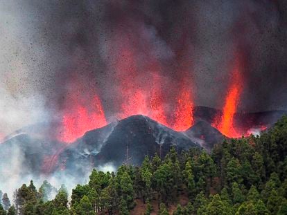 Lava and ash are spewed into the air during the volcanic eruption in La Palma.
