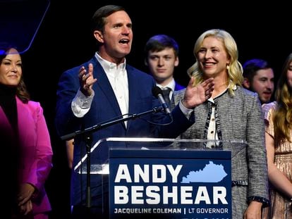 Kentucky Governor Andy Beshear with his wife, Britainy Beshear, in his acceptance speech after being re-elected to office on Tuesday in Louisville.