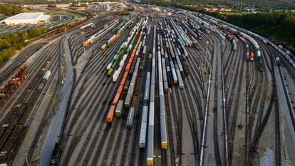 Freight train cars sit in a Norfolk Southern rail yard on Sept. 14, 2022, in Atlanta.