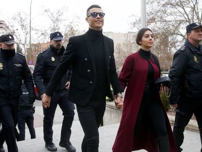 Ronaldo and his partner, Georgina Rodríguez, arrive at the Madrid court on Tuesday morning.