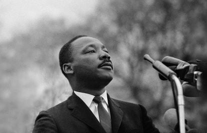 Dr. Martin Luther King, Jr. speaking before crowd of 25,000 Selma To Montgomery, Alabama civil rights marchers, in front of Montgomery, Alabama state capital building on March 25, 1965
