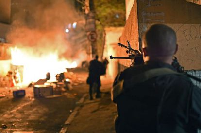 Unrest escalates in the Pavão-Pavãozinho shantytown in Rio de Janeiro.