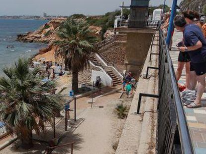 The young men died after falling 12 meters from the seaside promenade in Orihuela, in Alicante province