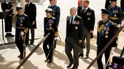 King Charles III with his sister, Princess Anne, followed by Prince Andrew, without military uniform, and Prince Edward behind Elizabeth II's funeral procession, on September 19. 2022 in London.