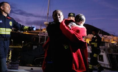 A migrant woman with her baby after landing in Fuerteventura in November.