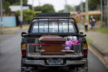 The body of Vilma Trujillo is driven home for burial.