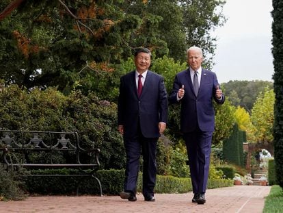 US President Joe Biden gives a thumbs up during a walk with his Chinese counterpart Xi Jinping during Wednesday's bilateral summit.