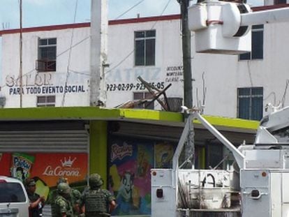 Authorities take down a hidden surveillance camera in Reynosa.