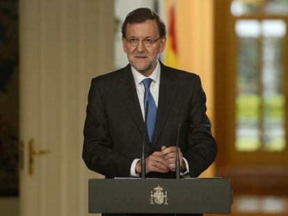 Spanish Prime Minister Mariano Rajoy speaks during a press conference at the Moncloa Palace in Madrid on December 27.