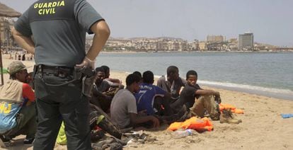 A group of migrants on the beach at the Spanish exclave of Melilla last week.