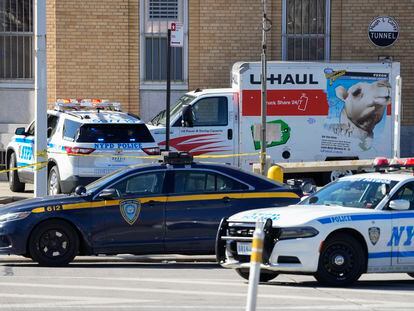 Police vehicles surround a truck that was stopped and the driver arrested, Monday, Feb. 13, 2023, in New York.
