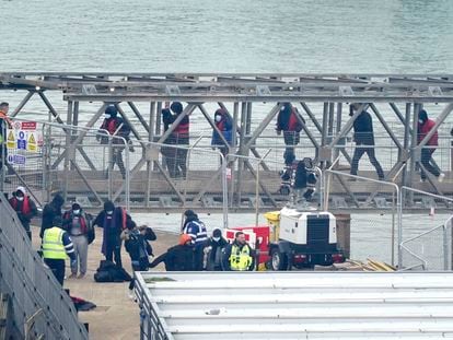 A group of people thought to be migrants are brought in to Dover, Kent, onboard a Border Force vessel following a small boat incident in the Channel, England, Monday March 6, 2023.