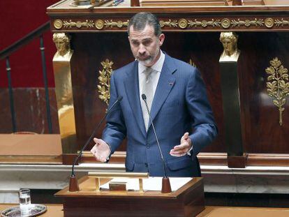 King Felipe VI of Spain delivers a speech at the French National Assembly.