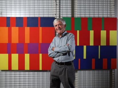 Tomás García Asensio stands in front of a computer-designed painting he created in 1970; Reina Sofía Museum, Madrid.