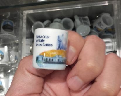 Miniature cups for sale at the souvenir shop.