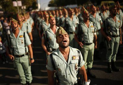 The Spanish Legion troops participate in the parade on Castellana Avenue in Madrid.