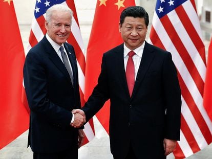US leader Joe Biden (l) and Chinese President Xi Jinping in a file photo from 2013.