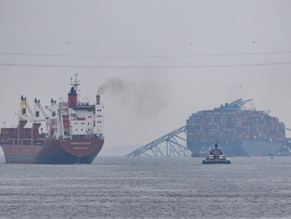 A container ship travels east on the Patapsco river, near the Dali cargo vessel following the collapse of the Francis Scott Key Bridge in Baltimore, Maryland, U.S., March 28, 2024.