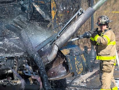 Firefighters work the scene after a tanker truck overturned on US 15 in Frederick, Maryland, on Saturday, March 4, 2023.