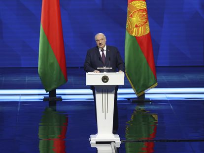 In this photo provided by the Belarusian Presidential Press Service, President Alexander Lukashenko delivers a state-of-the nation address in Minsk, Belarus, on March 31, 2023.