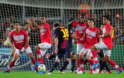 Saving the day: Barcelona&rsquo;s Lionel Messi (center) in Champions League action against Spartak Moscow.