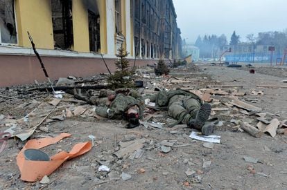 The bodies of Russian soldiers next to a bombed-out school in Kharkiv.