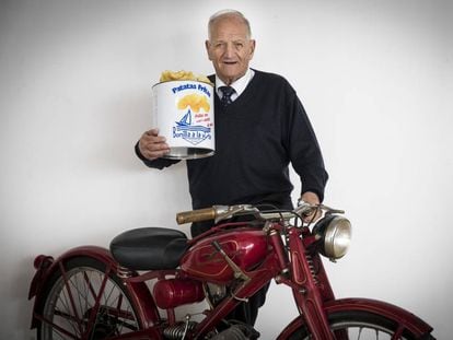 César Bonilla, 87, with the Guzzi motorbike he used to make deliveries in the 1950s.