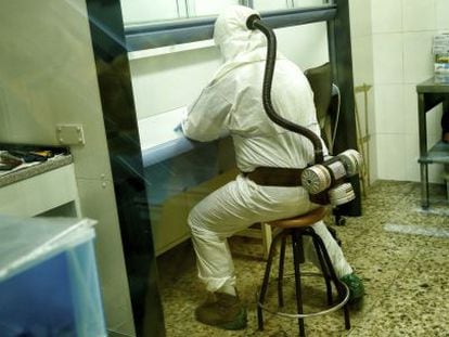 A technician inside the storeroom reserved for the largest drug hauls.