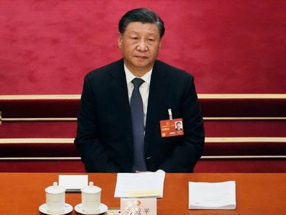 Chinese President Xi Jinping attends a session of China's National People's Congress (NPC) at the Great Hall of the People in Beijing, Tuesday, March 7, 2023.