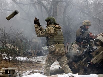 Ukrainian soldiers fire at Russian positions on the eastern front, in the Luhansk region, on January 16.
